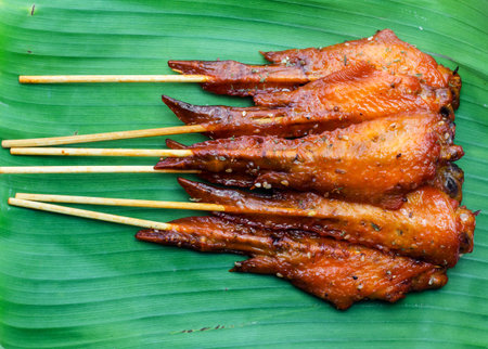 Fresh made chicken wing satay skewer, Traditional thai cuisine.の写真素材