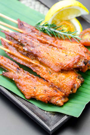 Fresh made chicken wing satay skewer, Traditional thai cuisine.の写真素材