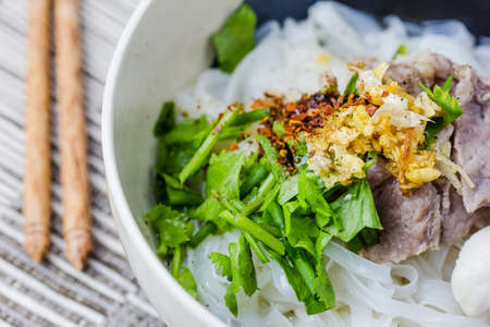 Asian style beef noodles in soup, Beef noodle with meatballsの写真素材