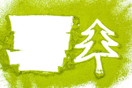 Christmas tree with powdered green tea on white backgroundの写真素材