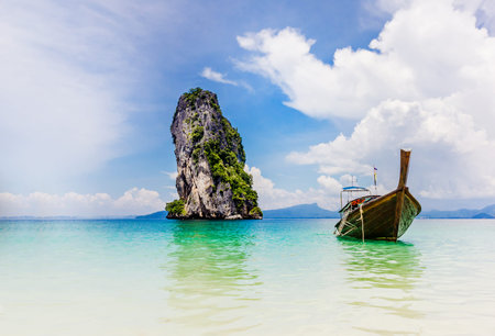 Long-tail Taxi boat on the beautiful beach, Poda island krabi,South Thailandの写真素材