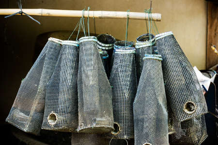 Ancient fishing equipment of rural Thailand.の写真素材