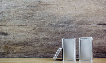 An aluminum Box top on wooden backgroundの写真素材