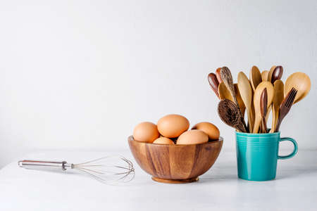 Egg in a wooden bowl on wooden table . Chicken Egg.の写真素材