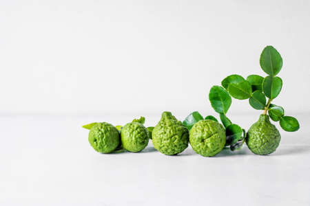 Bergamot fruit on white wooden table background .の写真素材
