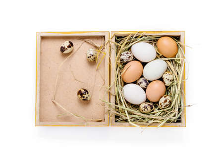 different organic egg types in wooden boxの写真素材
