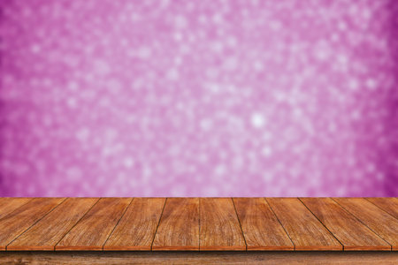 Wood table top on blurred abstract background - can be used for montage or display your productsの写真素材
