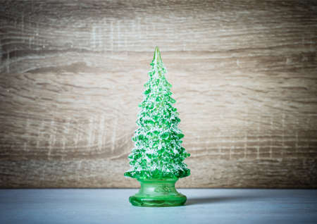 Christmas tree decoration on a wooden backgroundの写真素材
