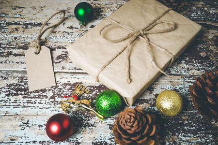 Christmas gift boxes  on rustic wooden backgroundの写真素材