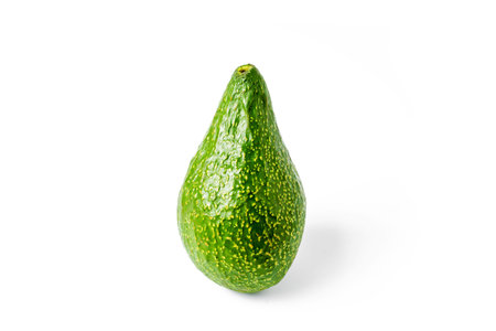 Green fresh whole avocado on white background