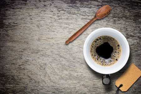 Top view cup of coffee on table backgroundの写真素材