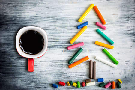 Christmas Tree, Christmas tree made of crayons and cup of coffeeの写真素材