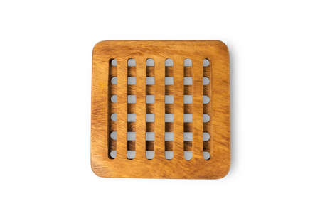 Round wooden trivet isolated on white backgroundの写真素材