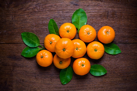 Fresh orange fruits on  table. Top view