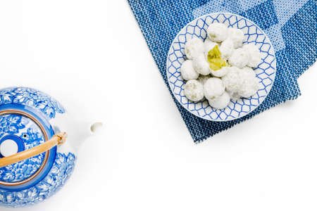 Coconut pandan ball in ceramic bowl on tableの写真素材