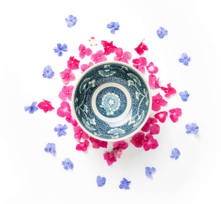 frame with Hydrangea flower and Blue plumbago flower isolated on white background. flat lay, overhead viewの写真素材