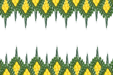 Decoration background made from flower and green banana leaf. Thailandの写真素材