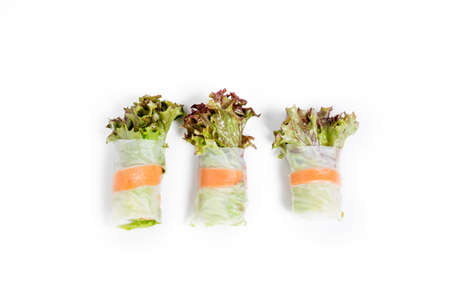 Fresh cut salad rolls isolated on white backgroundの写真素材