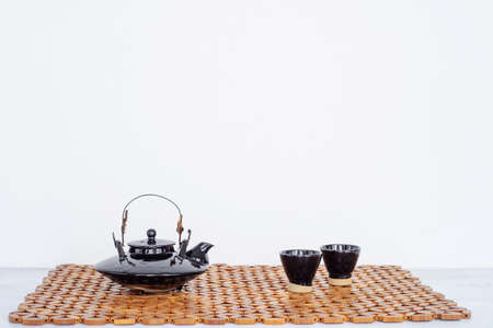Closeup of tea set on white backgroundの写真素材