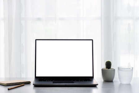 Office desk table with laptop computer, supplies with copy space in the office.の写真素材