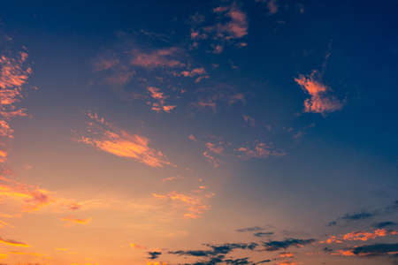 colorful dramatic sky with cloud at sunsetの写真素材