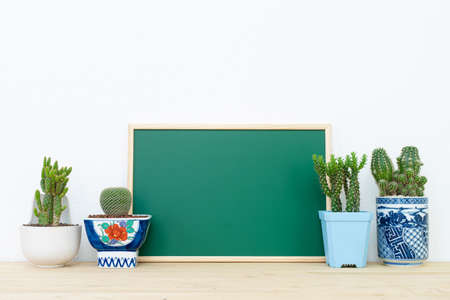 Mockup of frame poster and cactus pot, interior backgroundの写真素材