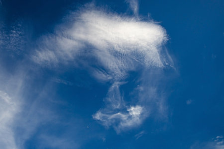 white fluffy clouds in the blue sky