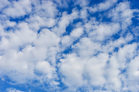 Cloudscape with altocumulus clouds, Altocumulus middle-altitude cloud in stratocumuliform - natural...