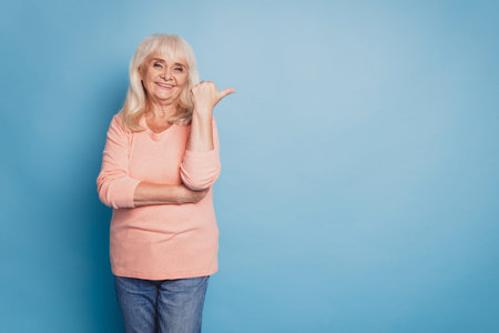 Photo of pretty old lady direct thumb empty space