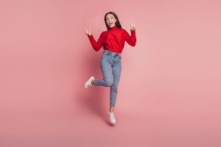 Full length photo of jumping high lady v-signing positively wear casual clothes