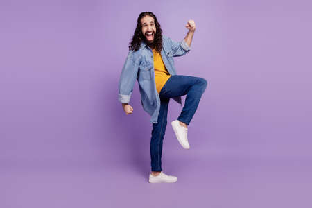 Closeup profile photo of bearded guy raise fists have achievement successの写真素材