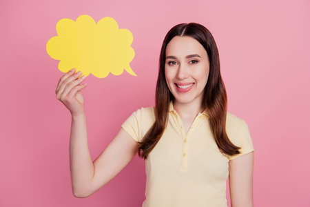 Photo of confident speaker lady hold mind bubble cloud card on pink backgroundの写真素材