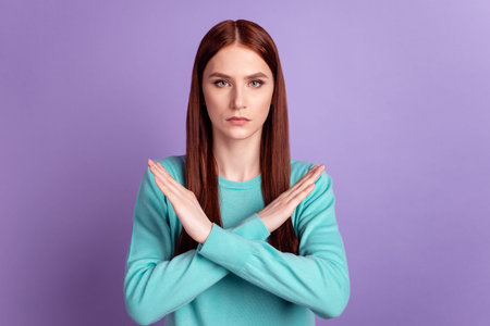 Photo of young woman crossed hands forbidden denial reject symbol isolated over violet color...