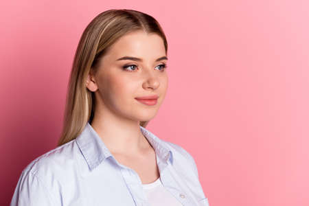 Profile side photo of young pretty woman look empty space confident clever lawyer isolated over pink color backgroundの写真素材