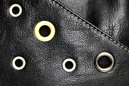 Black leather background with studsの写真素材