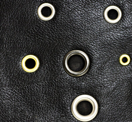 Black leather background with studsの写真素材