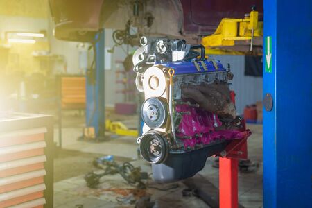 The old engine after overhaul in a car workshopの写真素材