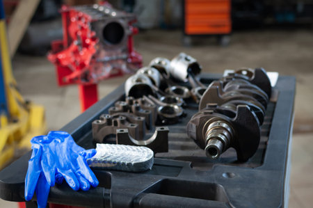 the car cylinder block and crankshaft in workshop. engine overhaul in a small service