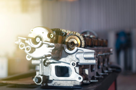 old car engine cylinder head repair in workshop