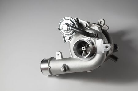 new turbocharger of the car on white backgroundの写真素材