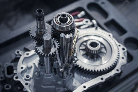 repair of a gearbox in a car workshop. the insides of the manual transmission. Close upの写真素材