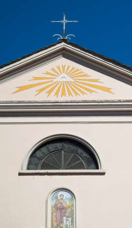 the Eye of Providence (the all-seeing eye) painted on a small church in Italyの写真素材