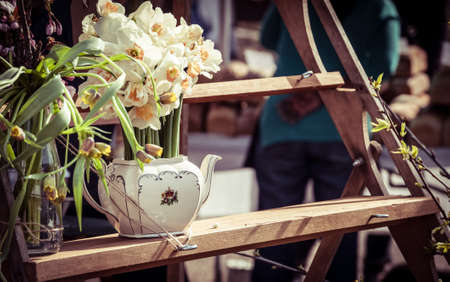 close-up photo of white daffodils sold at a marketの写真素材