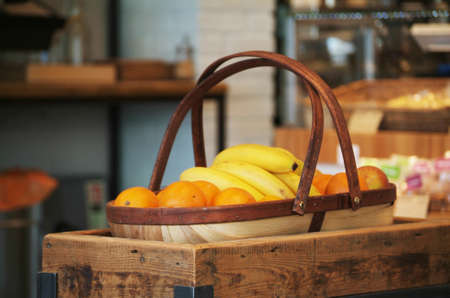 a fruit basket photographed in a cozy little cafe in Londonの写真素材