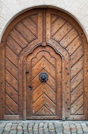 closeup photo of a beautiful wooden door photographed in Pragueの写真素材