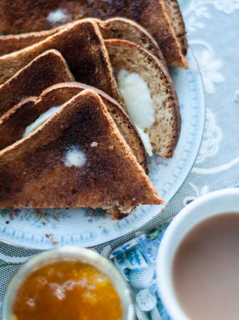 traditional English toast and a cup of teaの写真素材