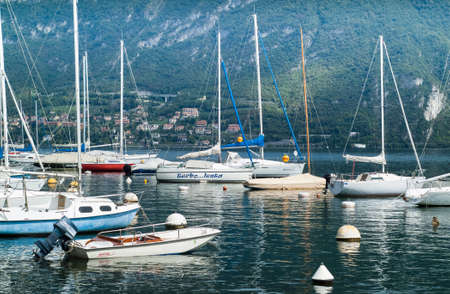 Bellagio, Italy - September 2nd, 2015: photo of boats floating on Lake Como near the town of Bellagio, Lombardy, Italy.のeditorial素材