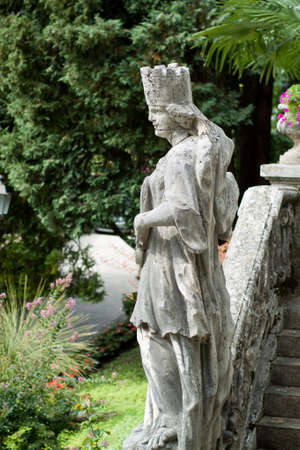 Varenna, Italy - September 4th, 2015: white stone statue photographed at Villa Monastero in Varenna, Italy.のeditorial素材