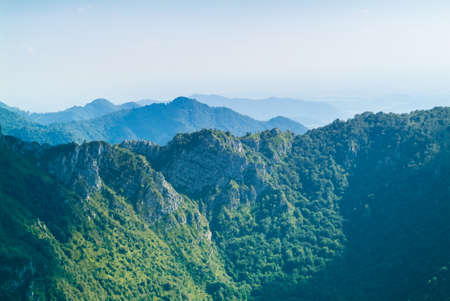 a lush green mountain photographed from Piani d'Erna (part of the Alps) near Lake Como in Italyの写真素材