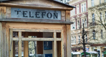 closeup photo of a wooden telephone booth in Karlovy Vary, Czech Republicの写真素材